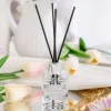 Aroma diffuser, glass bottle aroma diffuser, black oil absorber, label, white circular base, aroma diffuser, portable aroma diffuser, flame fireplace, automatic aroma diffuser, two-fluid aroma equipment details Picture